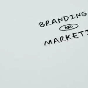 A minimalist image featuring the words 'Branding' and 'Marketing' on a white background, ideal for digital marketing themes.